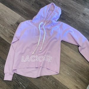 Light weight slightly cropped lavender hoodie, with white lettering on bottom.
